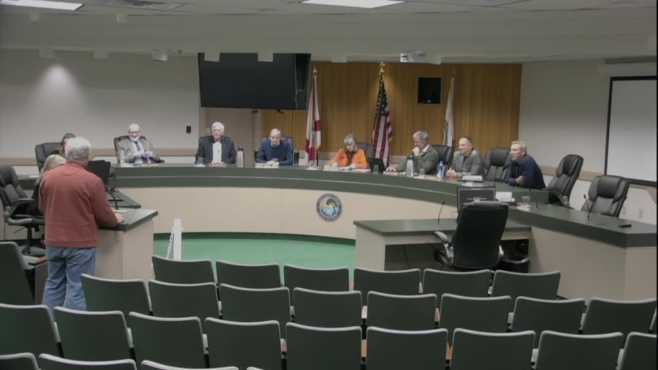 Fleming Island resident tells Clay County Planning Commission drainage behind Autumn Glen units remains unresolved