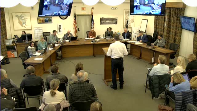 Commissioners approve breathing air compressor, ambulance purchase and final payment/resale plan for mini‑attack pumpers