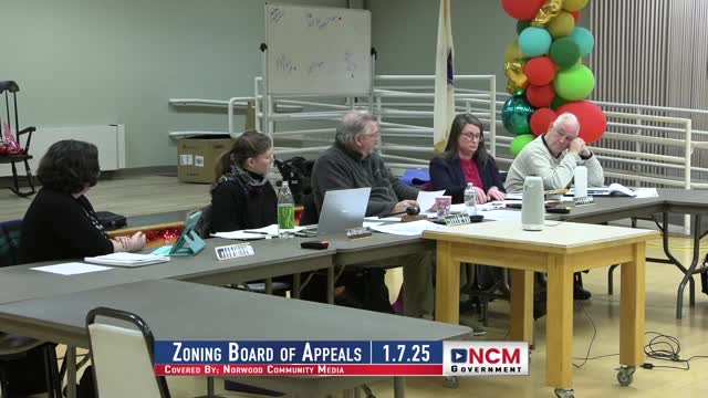 Zoning board denies accessory-parking permit for car-rental lot at Boston Providence Turnpike, 3–2