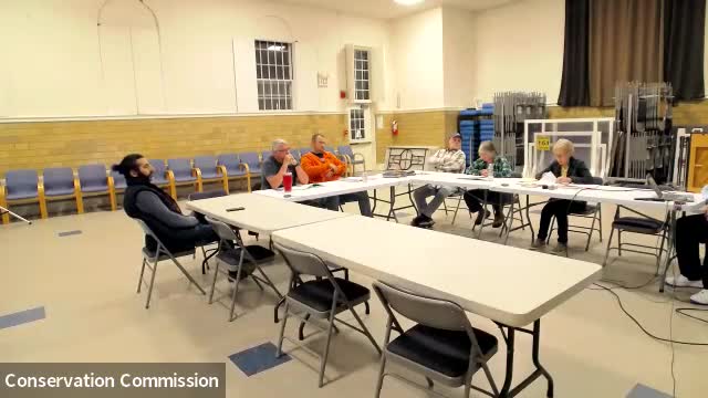 Conservation commission issues Negative Determination for garage in riverfront buffer with erosion controls