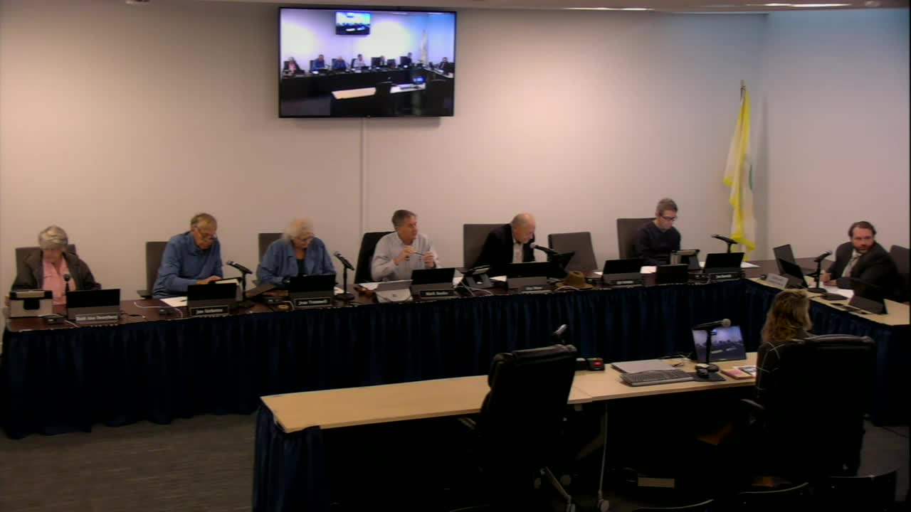 Board grants variance to allow standing-seam metal roof on pre‑VHP Country Club Apartments building