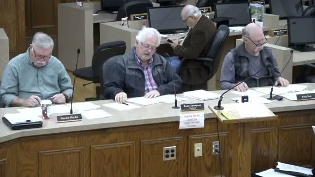 Neighbors and commissioner cite fire‑access, private‑drive concerns and board defers land division request