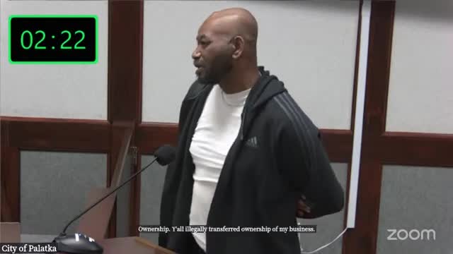 Business owner claims city fraud while defending ownership in heated public address
