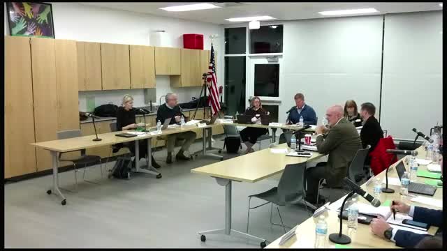 Board adopts revised policy on accelerated placement; members discuss safeguards and appeal options