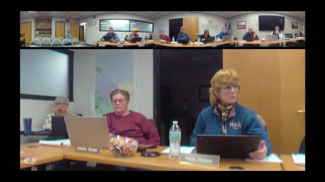 Peer review commends district systems; reviewers recommend comparing results with prior accreditation