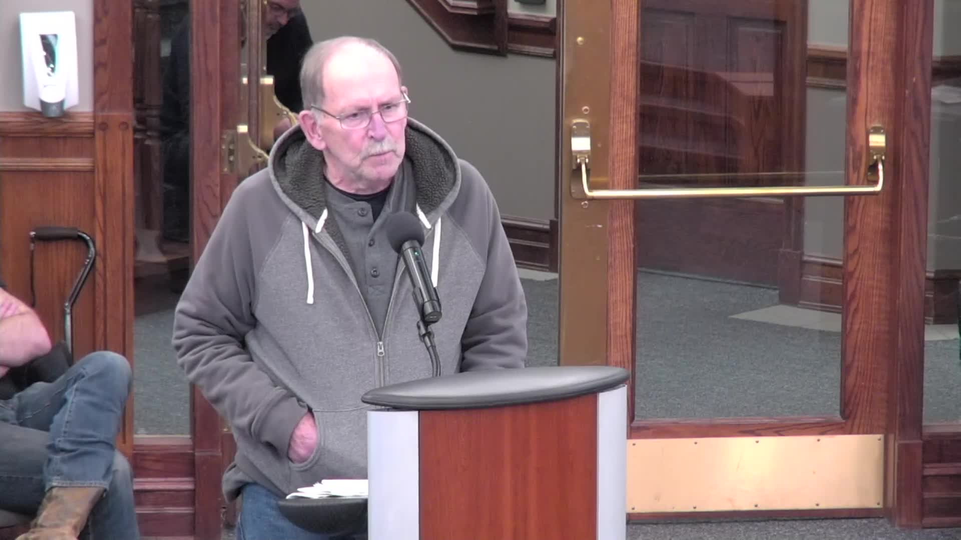 Loveland councilman disputes restraining order claims during heated public meeting