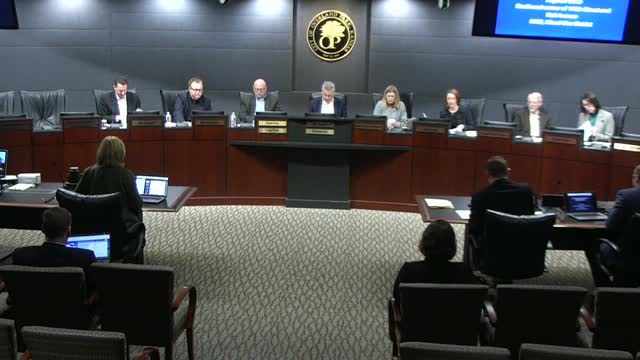 Final plan for Experia campus pad D approved with glazing deviation; commission requires corner glazing and added landscaping