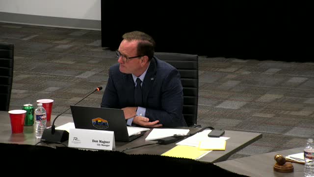 Council continues public hearing on proposed 38‑unit townhome development at 601 E. Main