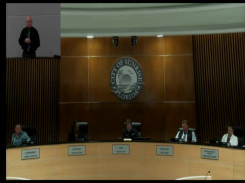 City officials debate new safety standards for parking lots near lakes after tragic incidents