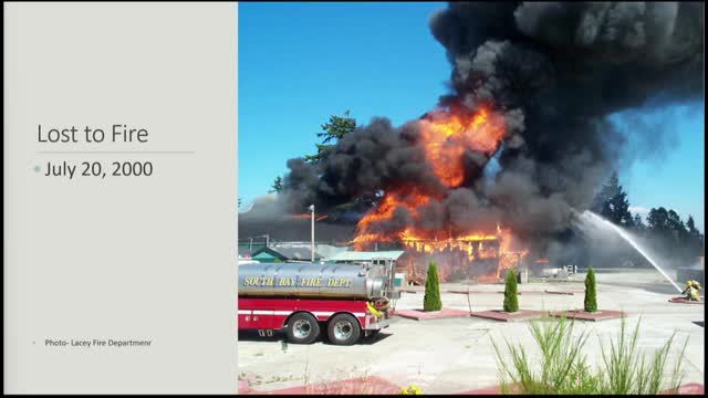 Lacey Fire Department battles blaze that collapses building and ignites five-acre grass fire