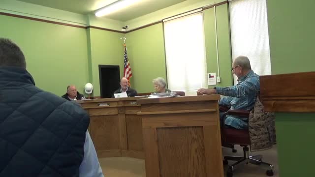 Applicant seeking access to landlocked parcel told to pursue easement in court; commissioners express reluctance to grant access