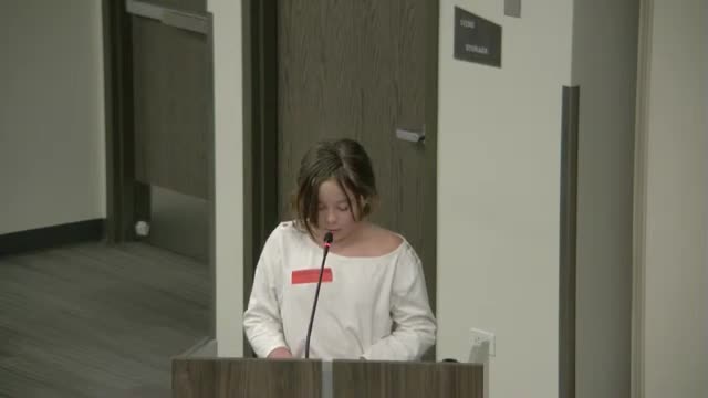 Students urge school board to end idling and protect the environment during public comment session