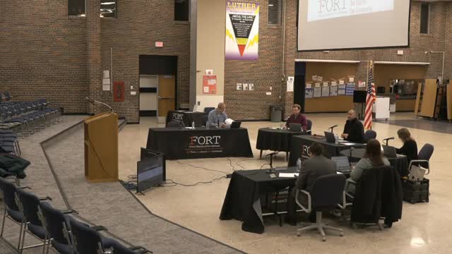 Board approves open-enrollment designation and two‑year administrative contracts; three candidates set for April ballot