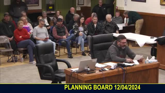 Residents rally against conservation committee's proposed wetlands regulations in heated town meeting