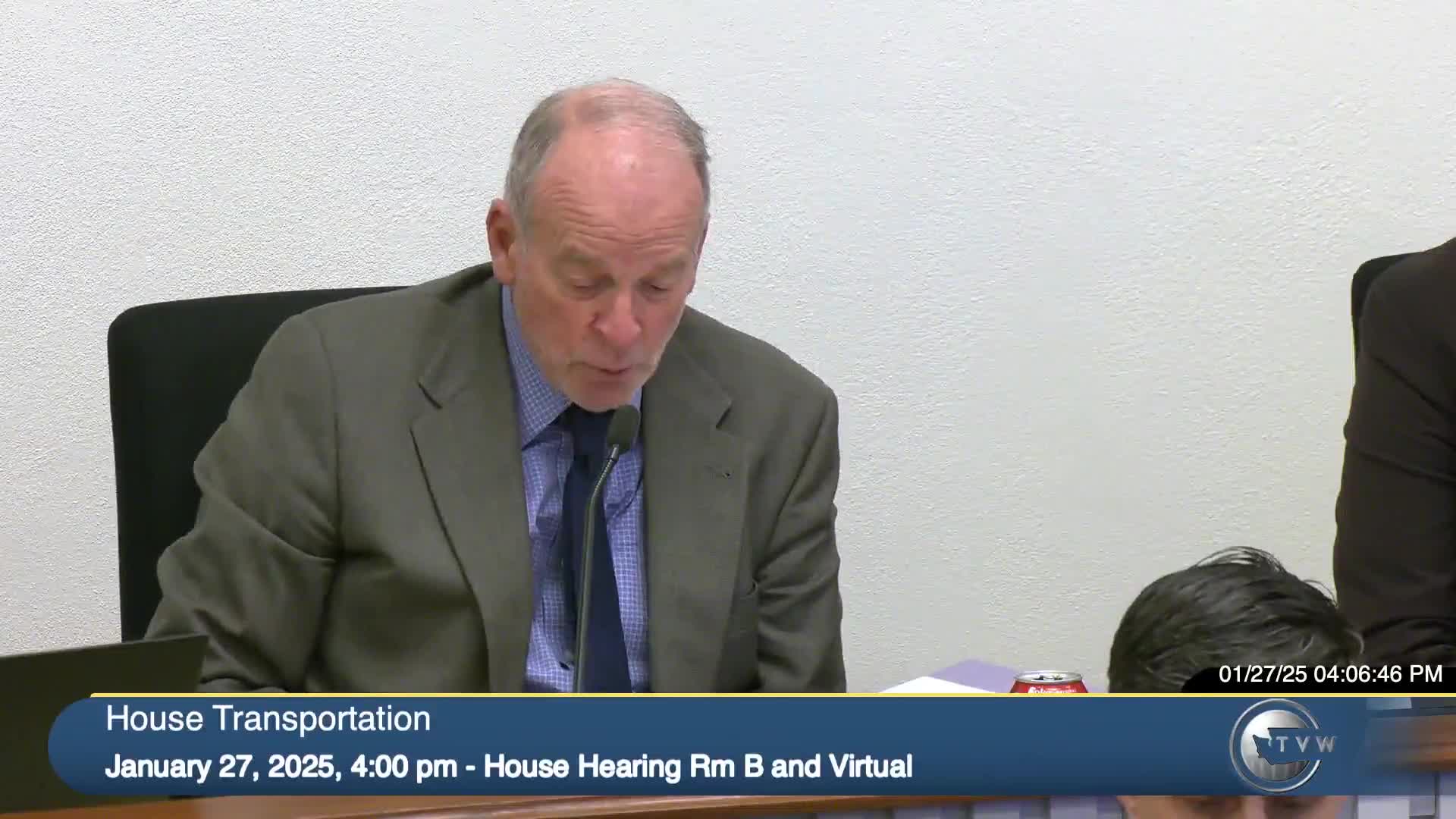 Committee hears bill to move Washington toward electronic vehicle titles while preserving same‑day paper option