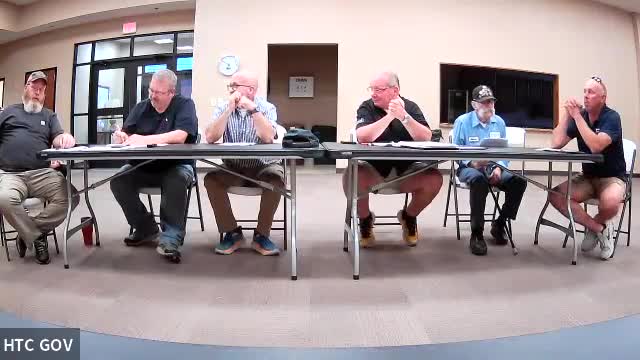 Local officials negotiate repairs for damaged school traffic light amid budget constraints