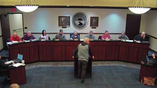 Golf-course cart-pad bid tabled after missing non-collusion affidavit; council removes $25,000 grant and extends bid acceptance