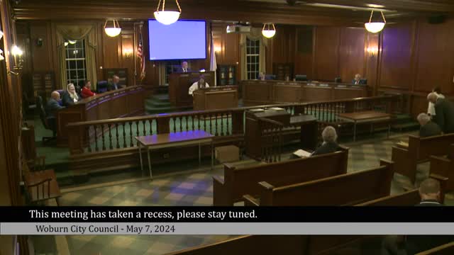 Woburn Council hears public concerns on new apartment development during open hearing