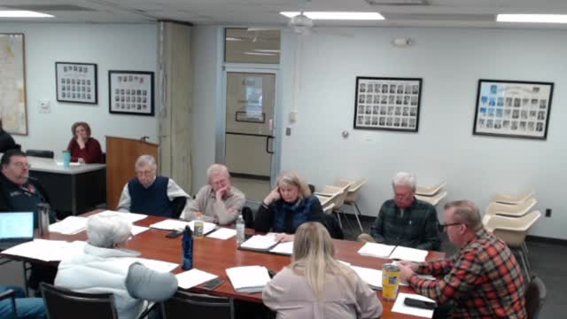 County committee records administrative updates: AV upgrades, new GIS site, claims approved, animal control hiring and property-fraud alerts