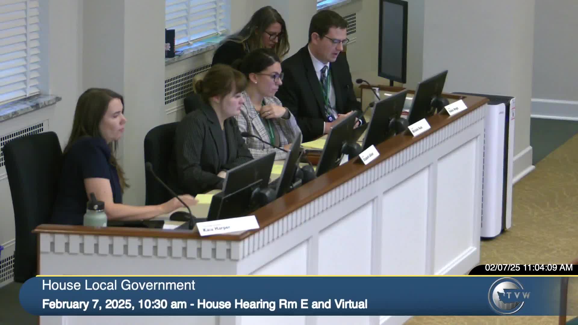 Committee approves diaper-changing requirement and marriage-license fee increase; amendment raises renovation threshold