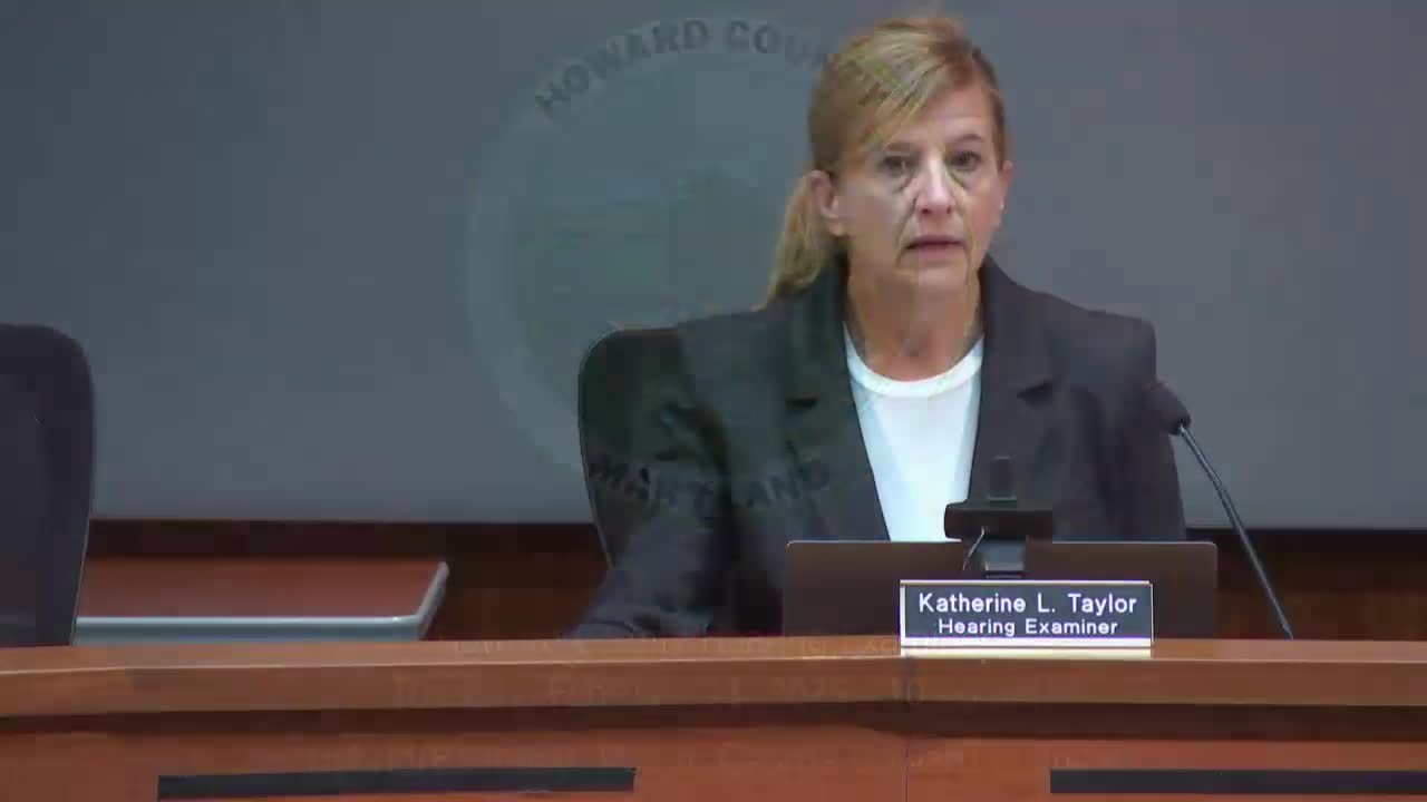 Hearing examiner weighs variances to formalize long‑standing auto sales and repair site on Route 1