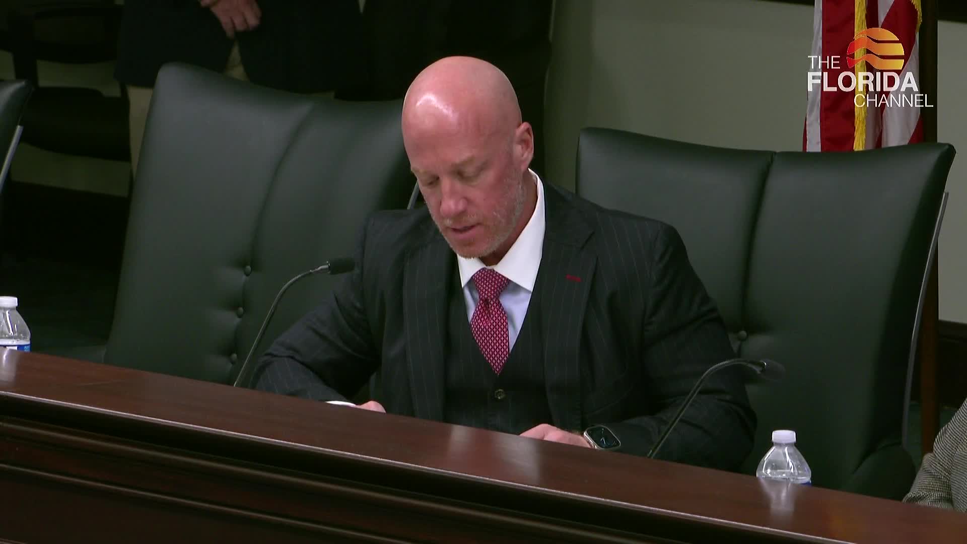 Panel sends flag‑display ban to committee calendar after heated testimony over classroom displays and "reasonable force" provision