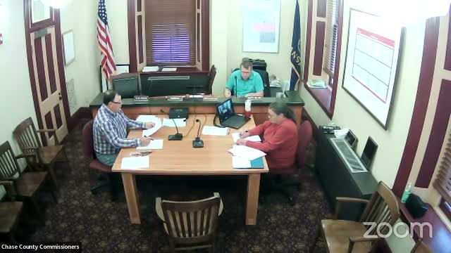 Commissioners approve multiple finance items: transfer, change order, payroll, warrants and a small community grant