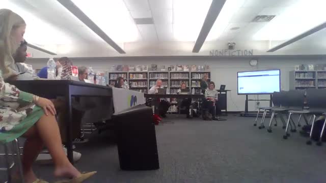 Board approves change order and several construction payouts, holds retainage until sidewalk completion