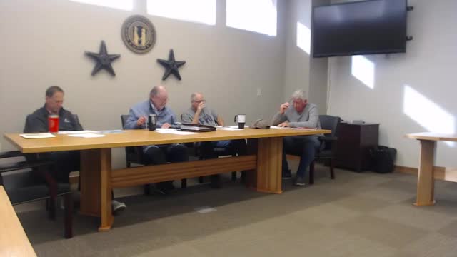 Commissioners discuss recurring theft of road signs at dangerous curve, ask staff to research prevention options