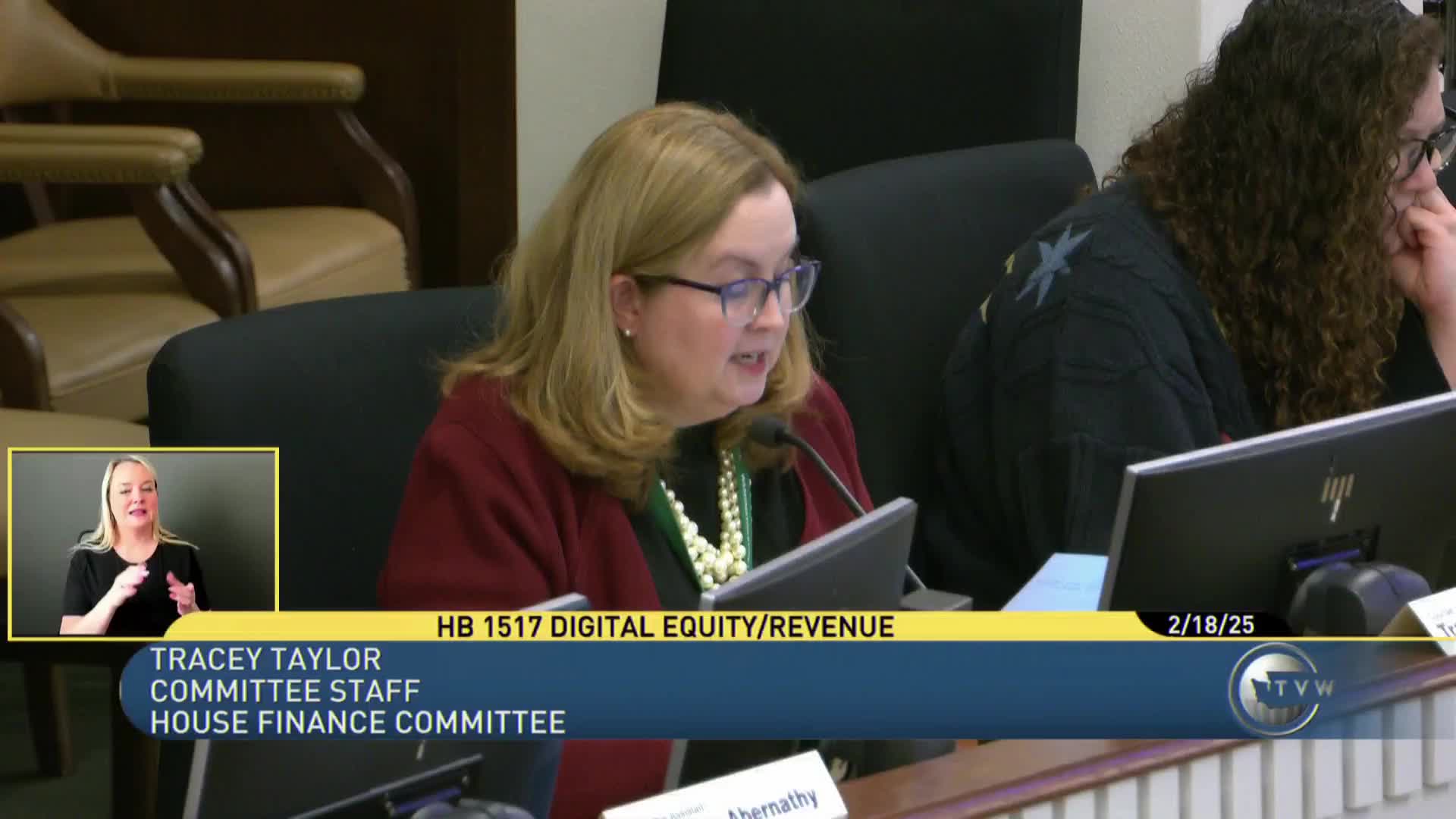 Heated hearing on $2 device excise for digital equity; business groups oppose, education and community groups support