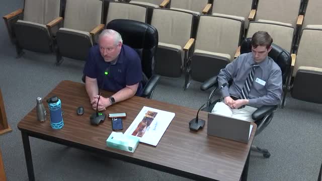 Council discusses fence disputes and whether to require surveys for new fences