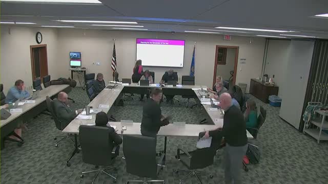 Board adopts multiple policy revisions, approves capital bids including $163,150 North High roof contract