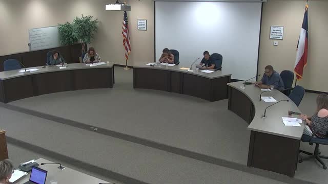 District meeting opens with prayer and pledge while honoring student Montana Moore