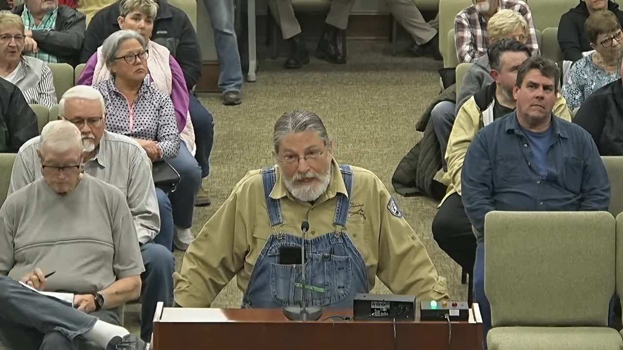 Local Resident Advocates for Affordable Housing Solutions in Water Department Meeting