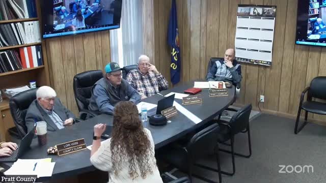 Election officials discuss accessibility for wheelchair users at voting sites