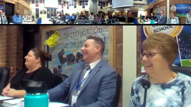 Students celebrate Hank Logan as this month's Dean of the Month