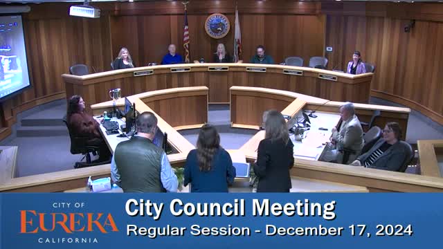 Community leaders celebrate successful holiday lighting project in downtown