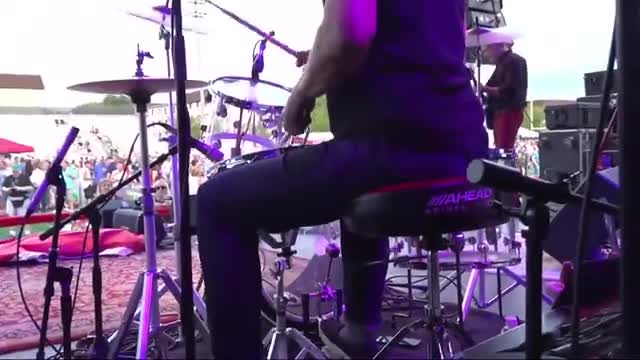 Ryan McMillan performs on high school jumbotron celebrating personal milestones