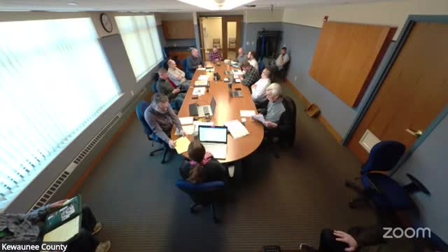 Committee discusses health‑insurance plan design options; staff to return with cost projections