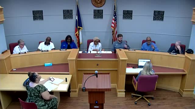 Board approves financials amid question on voting process