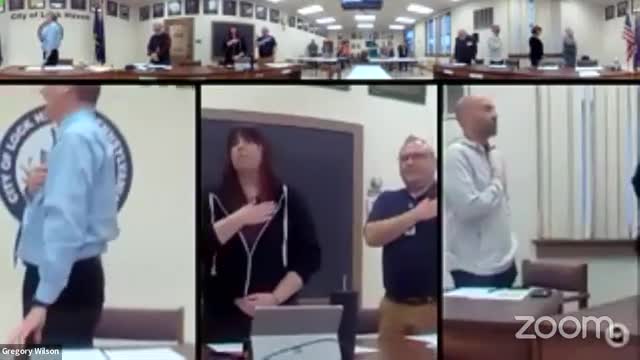 Karen Bridal advocates for Christian flag at Triangle Park during Faith Month