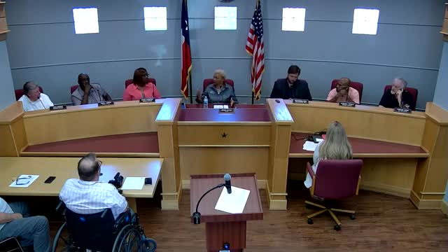 Board votes on suspension procedure for executive director amid controversy