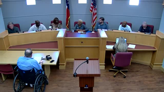 Council proposes motion to reinstate suspended economic director James Gentry