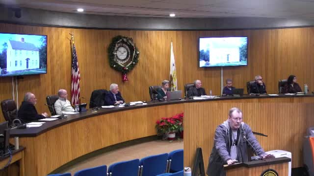 Rory Miller addresses sign size concerns at Veterans Memorial Parkway council meeting