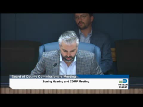 Commissioner defers neighborhood rezoning after urging residents to meet developer