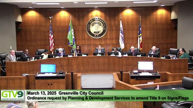Council denies proposed text amendment that would have legalized oversized commercial flags; Camping World faces fines and must permit pole