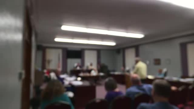 Community seeks recognition for late clerk Jim She and discusses veterans dinner