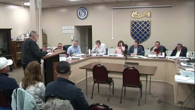 Tiverton residents debate recycling bin proposal citing wind issues and existing system effectiveness
