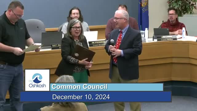 Oshkosh honors retiring city manager Mark Roloff with key and commendations