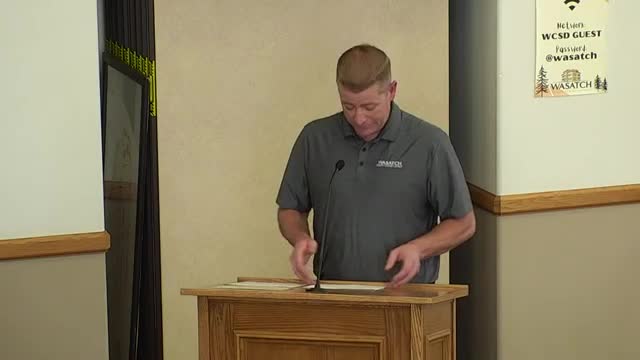 Wasatch County board approves school trust‑land plans and several vendor contracts; tables Road 113 RFP